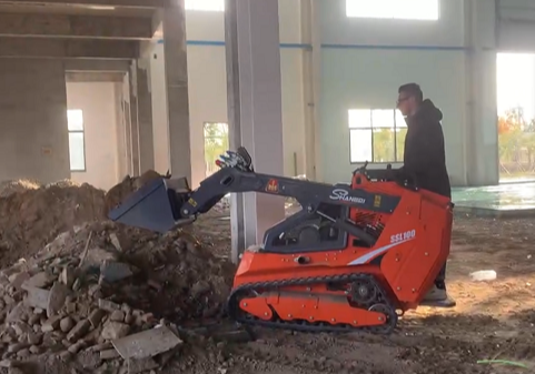 customer operate a skid steer loader at the construction site